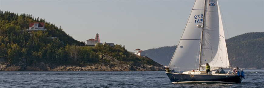 A sailboat sailing off Pointe-Noire.