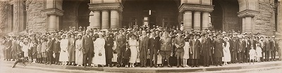 A large group of people standing for a photograph
