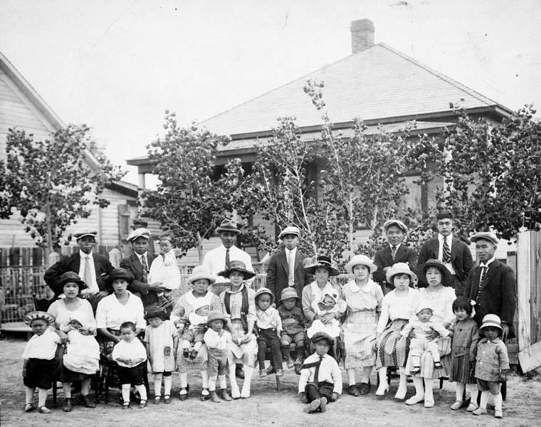 Group of kids and adults posing for a photo