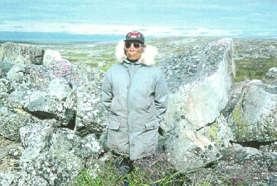 Person standing near rocks