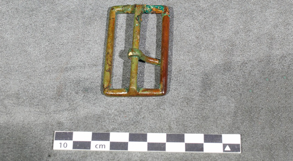 A metal rectangular belt frame with buckle. 
