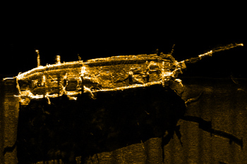 Sonar image of sailing ship from above.