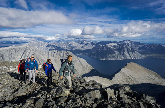 A group of four hiking at Torngat Mountains. 