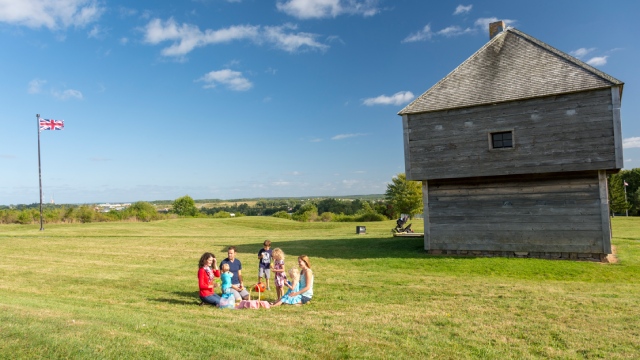 Visitors enjoy a picnic outside the Blockhouse