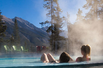 Two young women relaxing in the Banff Upper hot Springs