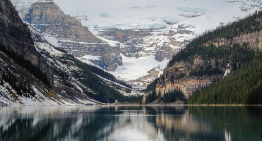 Lake Louise surrounded by mountains.