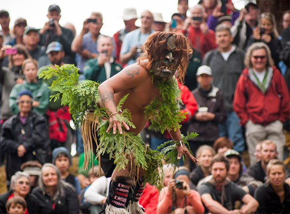 A Haida supernatural being, Gaagixiid, is chased from the site before the ceremony begins
