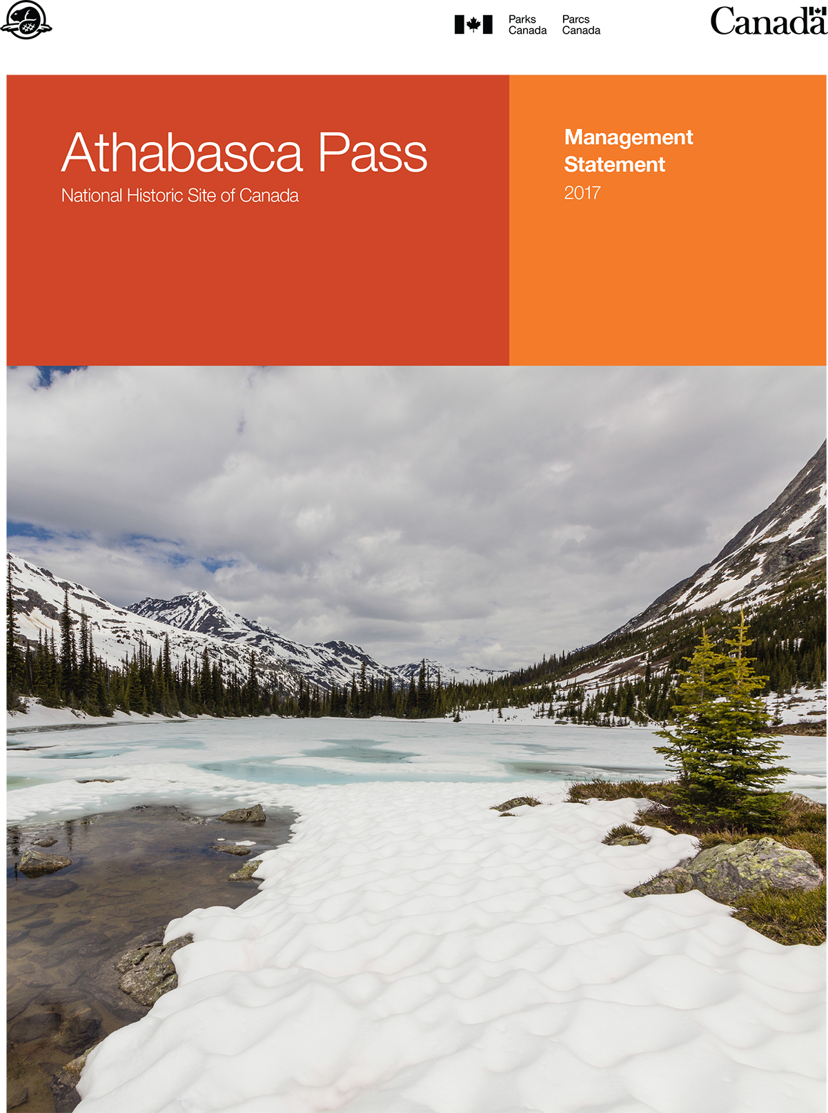 A mountain pass. Two orange rectangles. Written in white text are the words Athabasca Pass National Historic Site of Canada Management Statement 2017