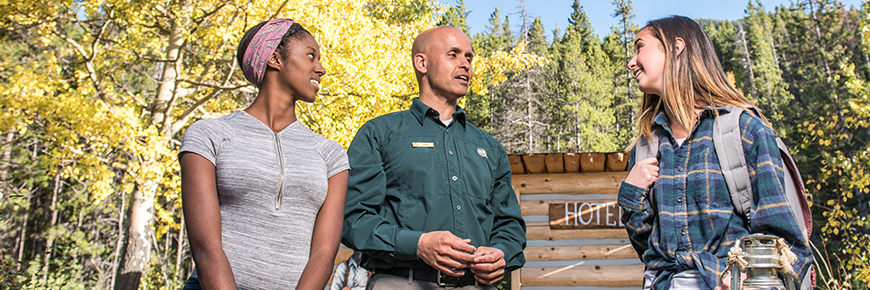 Parks Canada staff speaking to visitors