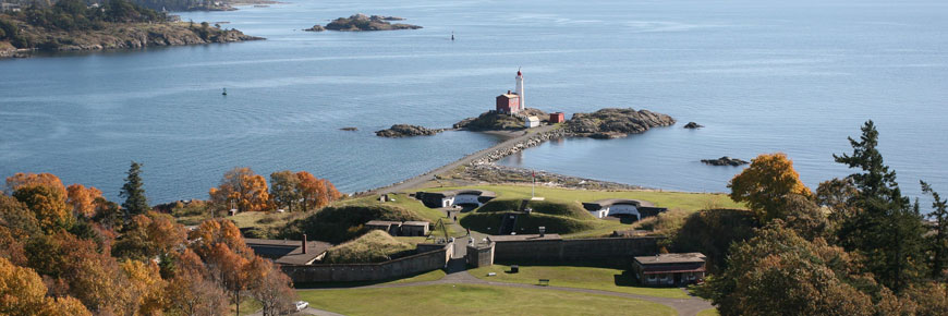 Aerial view showing the Lower  Battery of Fort Rodd Hill, and  Fisgard Lighthouse in the  background.