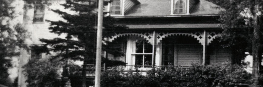 black and white image of a cottage
