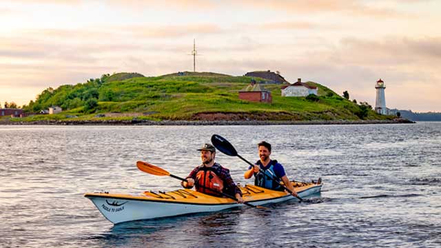 A couple in a kayak next to Georges Island.