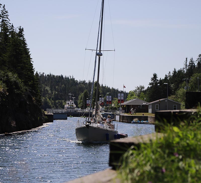 A sailboat in a canal