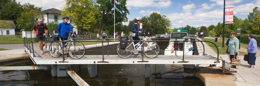 Cyclists crossing a lock