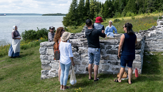 Visitors taking a guided tour through the ruins.