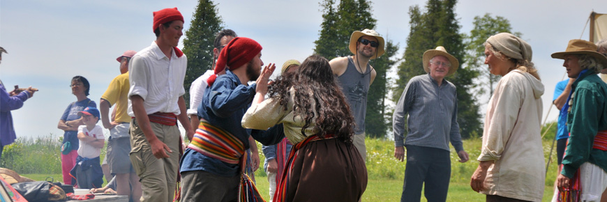 A group of people folk dancing 