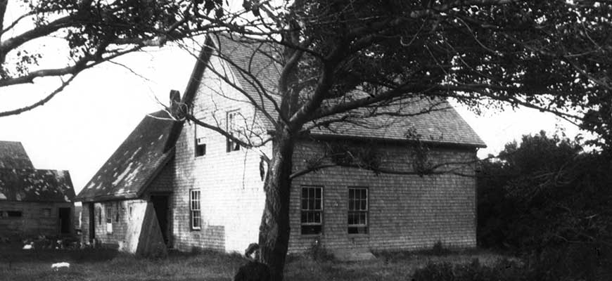 Black and white photo of original home.