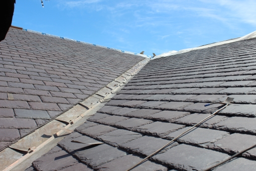 Roof with newly installed slate shingles. 