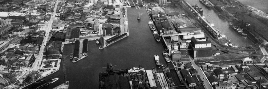 View of the Peel Basin and the Port of Montreal looking east, circa 1950.