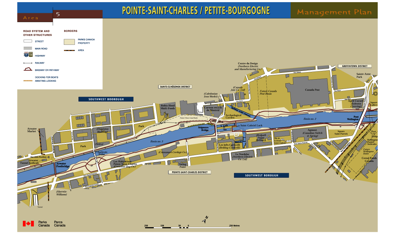 Map of the Pointe-Saint-Charles/Petite-Bourgogne Area giving the location of streets, roads, railways, pedestrian and bicycle paths, as well as the boundaries of Parks Canada land and the different planning areas. From West to East, locations are given for: Atwater tunnel and its services buildings, Atwater Market, Services Pavilion, Atwater foot bridge, Former Sherwin-Williams, Charlevoix bridge, Former Stelco, Former Dominion Wadding, Habitations Pointe-Saint-Charles (Canadian Bag), Basin No. 3, Former Consumers Cordage, Robin-Hood Multifoods, Swing Paint, Des Seigneurs bridge, Cartons Recyclés de Montréal, Former Caledonian Iron Works, Lofts Corticelli, Archaeological park, Saint-Gabriel Lock, Former Canada Jute, Nordelec (Northern Telecom), Supply weir, Centre du Design (Northern Eletric), Former Redpath Sugar, Future Des Postes basin, Ferme Saint-Gabriel site, Canada Posts, Basin No. 2, Agmont (Canadian Switch and Spring), April Cornell (Asbestos Covering) and Wellington bridge