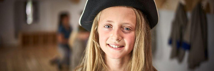 Young blond girl wearing a tricorne