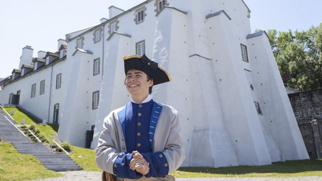 A costumed Parks Canada employee in the Fortifications of Québec National Historic Site.