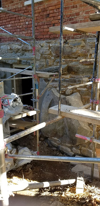 Scaffolding in front of the granary during renovations