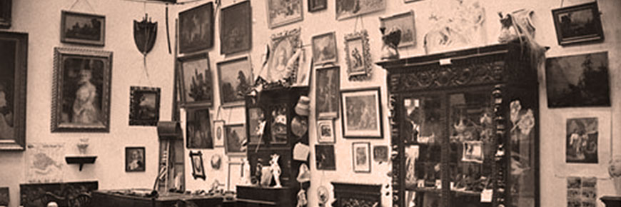 Walls covered with pictures and paintings