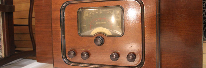 Old radio in varnished wood