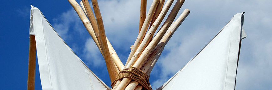 The top of teepee in a blue sky