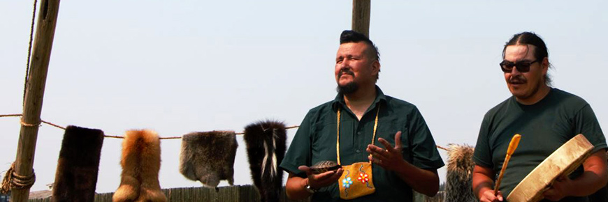 Two Indigenous interpreters doing a presentation at Fort Walsh National Historic Site