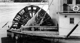 The <abbr>S.S.</abbr> <em>Casca's</em> paddlewheel partially iced up