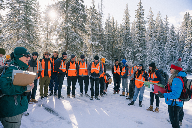 student group outdoors with Parks Canada staff