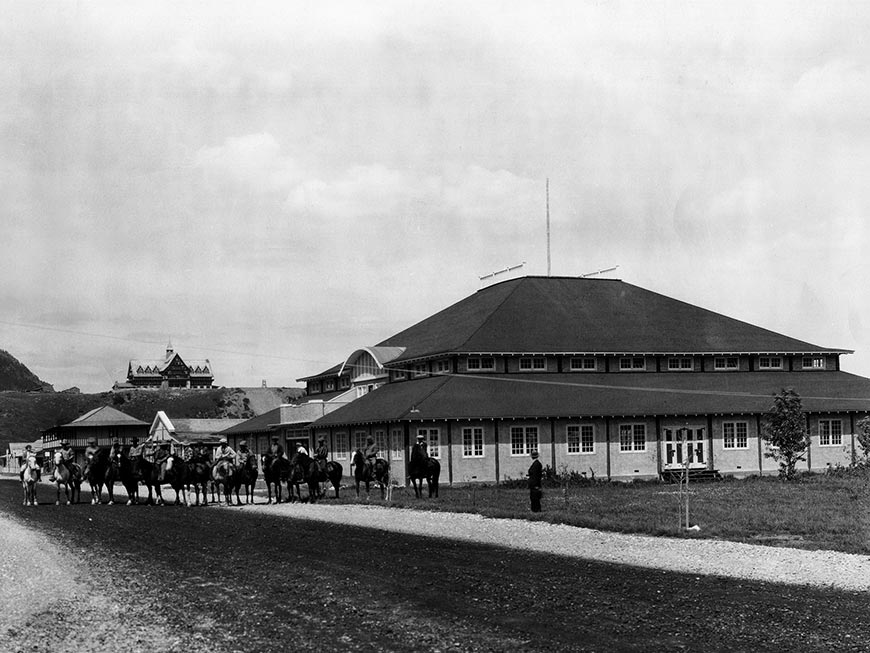 People on horseback outside the Waterton Dance Pavilion
