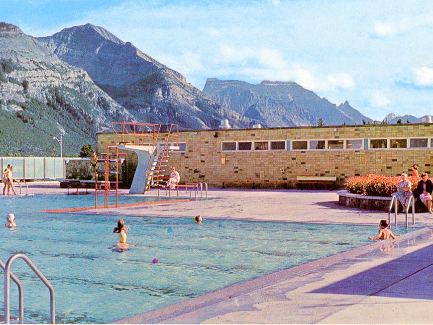 Visitors enjoying Waterton's outdoor swimming pool