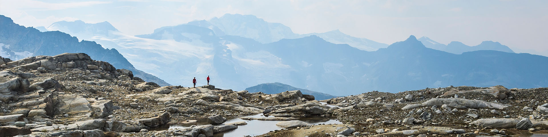 Two hikers high in the alpine
