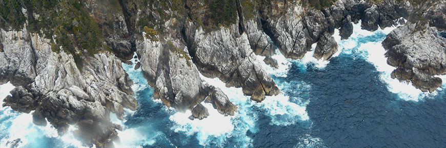 Waves crashing against a rocky coastline