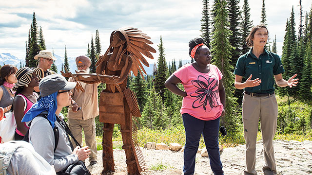 Parks Canada employee presenting an interpretive experience