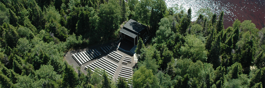 a coastal outdoor theatre amongst the trees