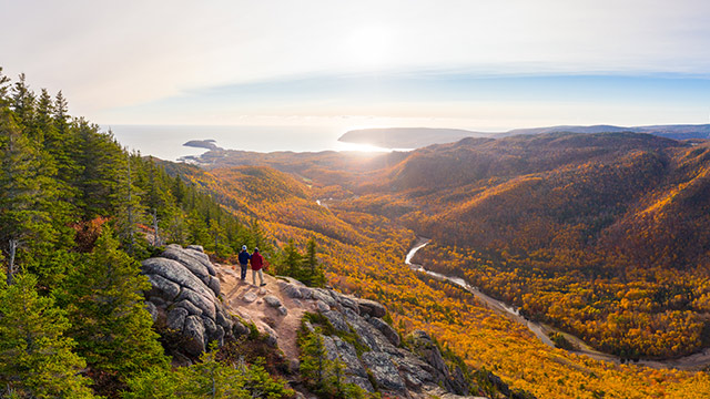 Two people on a rugged hiking trail in Cape Breton Highlands National Park