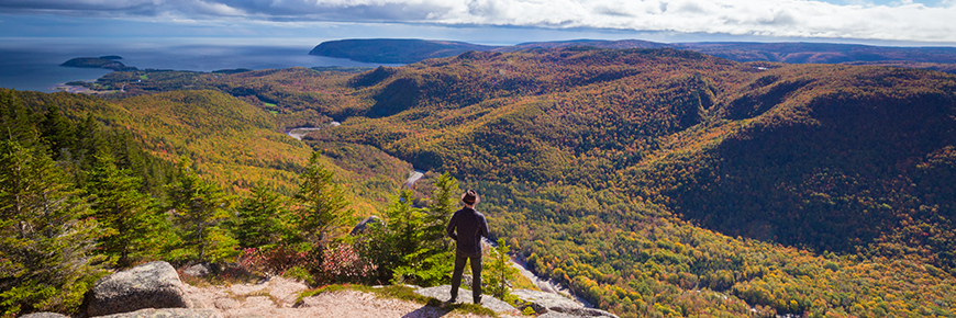 Hiker at the summit of  Franey