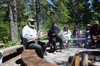 Hand drummers at the Fire Circle at Pukaskwa National Park