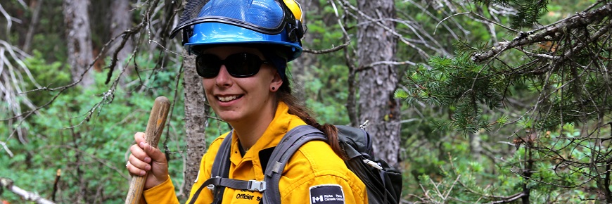 A fire crew member in the forest
