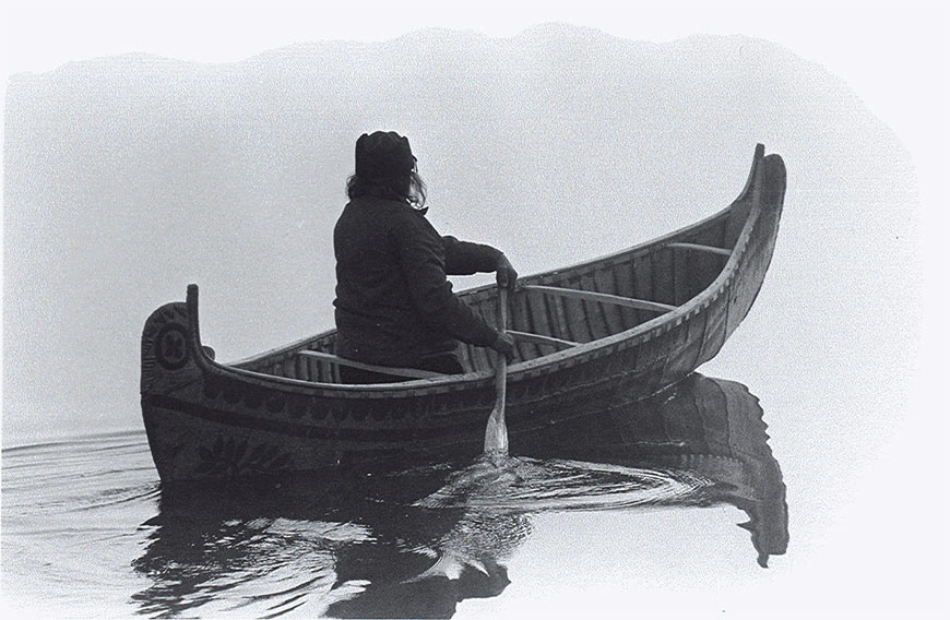 A man in a canoe.