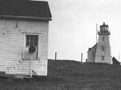 Historic photograph of the first lighthouse on île aux Perroquets