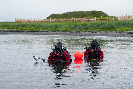 Divers in front of l'Anse-aux-Meadows site