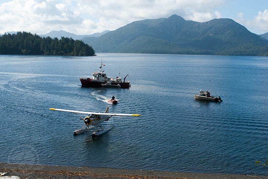 Boats and a float plane in front of Huxley camp