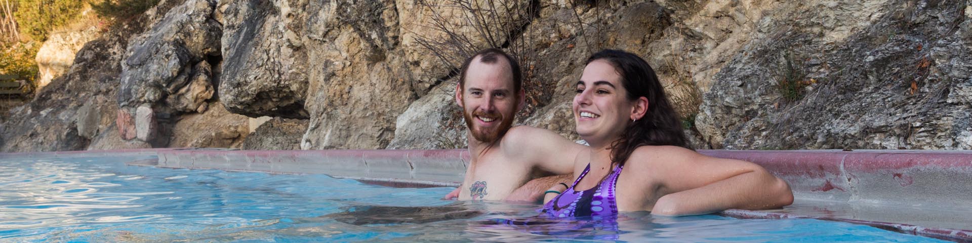 A couple relaxing in the radium hot Springs